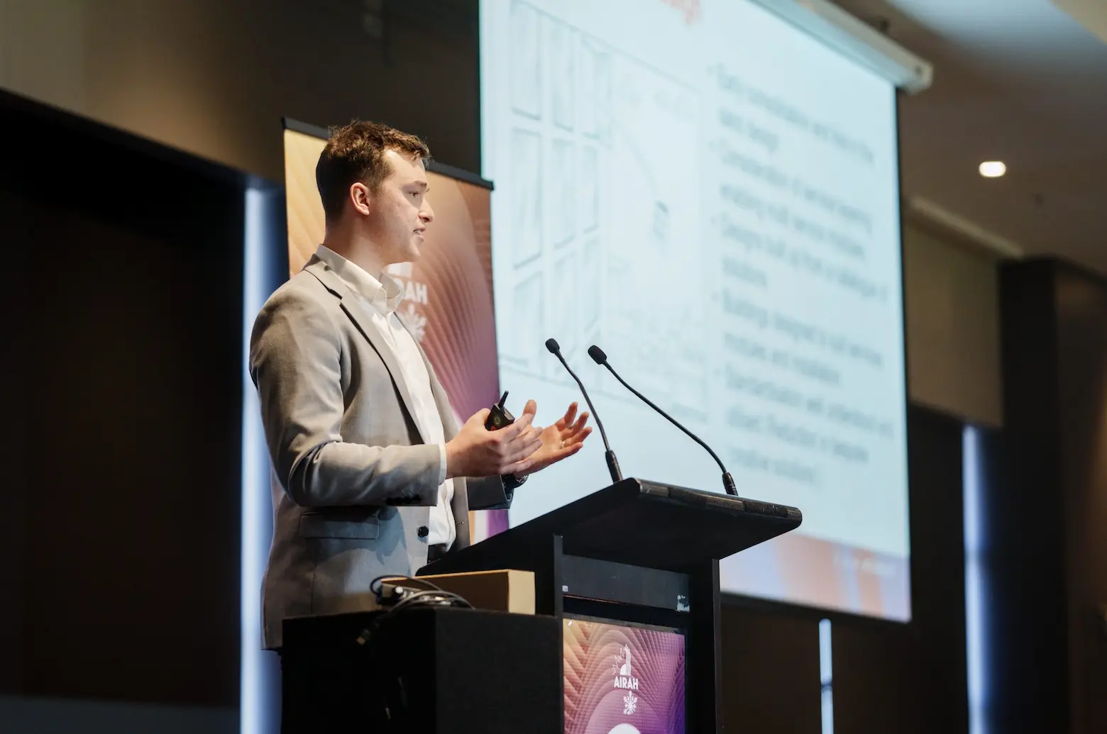 photo of a man giving a presentation at an AIRAH event